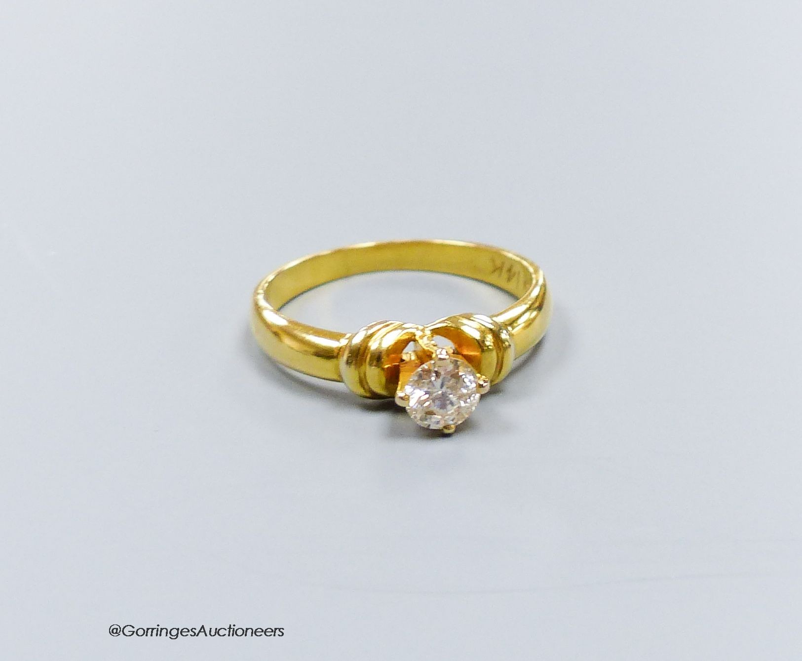 A 14k gold solitaire diamond ring, approx. 0.33ct, size L, gross 3g.